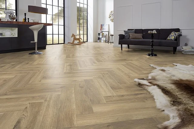 Series Woods 8mm Herringbone Laminate Flooring Gentle Gold Oak — merchant product photo